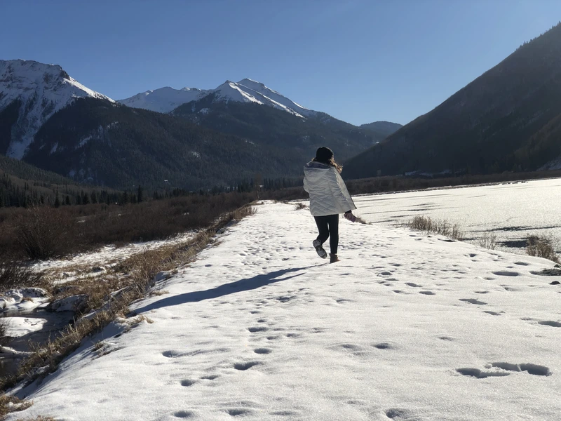 Elena walking through the snow